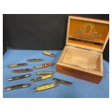 Pocket knives in wood box