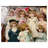 Lot of porcelain dolls & stands
