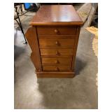 Side table with magazine slots and drawers