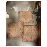 Three decorative pillows