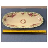 Vintage Porcelain marked dish small chip