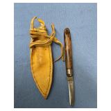 Knife with leather sheath
