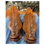 Wall-mounted candle holder with globes