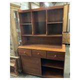 Desk with wall shelves