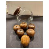 Glass canister with wood fruit
