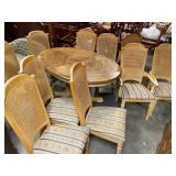 Kitchen table and 10 chairs, and two leaves