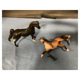 Two mini Breyer horses one broke