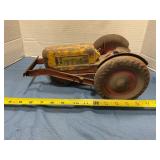 Vintage tin tractor with loader