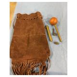Brown leather drawstring pouch with gun parts