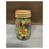 Mason jar full of marbles w/ zinc lid