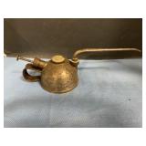 Vintage pump-style oil can