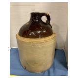 Stoneware jug with handle, has damage,no ship
