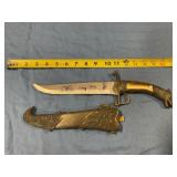 Stainless steel knife with metal sheath