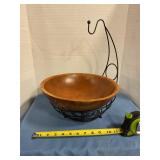 Wooden fruit bowl with a black metal stand
