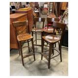 Four wood barstools