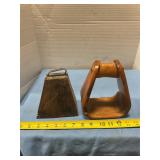 Wooden stirrup and old cowbell