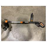 Works battery weed eater with  charger