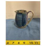 Small pottery handled pitcher