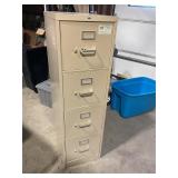 Metal four drawer file cabinet