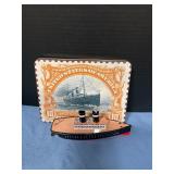 Tin toy wind-up steamship in display stamp box