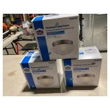 Three flush mount ceiling fixtures
