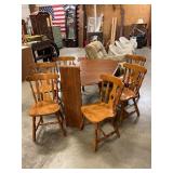 Kitchen table with six chairs and one leaf