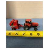 Case IH 7140 with round bailer