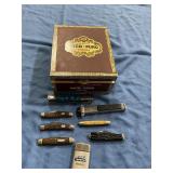 Cigar box with pocket knives