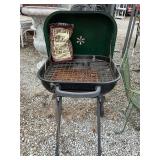 Aussie charcoal grill with Mesquite smoking chips