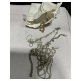 Costume jewelry in satin bag