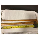 Two wooden mini bats