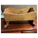 Wooden doll cradle
