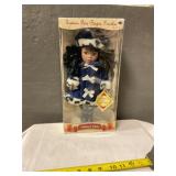 Porcelain doll in box
