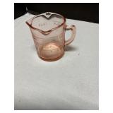 Pink depression glass measuring cup
