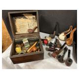 Vintage wood box with assorted pipes