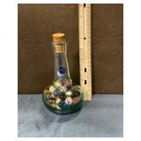 Genie style bottle with marbles