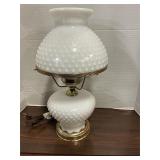 Hobnail milk glass lamp base has rust