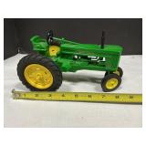 John Deere plastic toy tractor