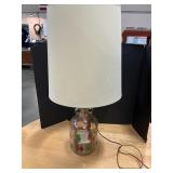 Glass Jug Lamp w chair inside