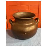 Painted pot. Cracked