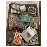 Flat of costume jewelry