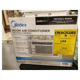 Midea window air conditioner with mounting bracket