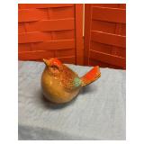 Ceramic bird. Tail is cracked