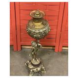 Antique brass cherub oil lamp