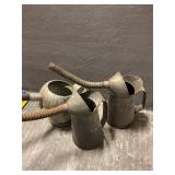 3 vintage oil can