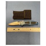 Assisted opening pocket knife with sheath