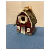 Ceramic barn birdhouse