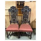 Antique carved wood chairs with padded seats