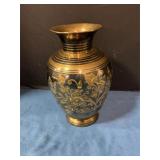 Brass vase with floral design