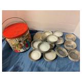Porcelain and glass canning lids in tin